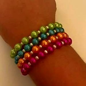 4 stacked beaded bracelets